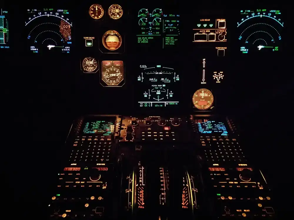Close up of a virtual air traffic control radar screen showing aircraft blips